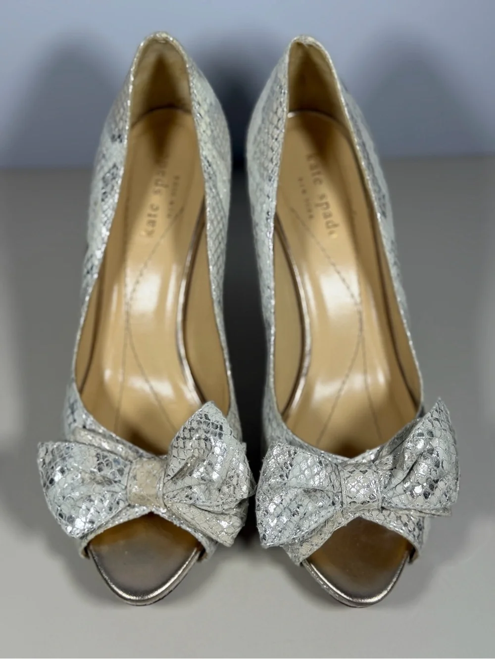 kate spade Silver Snake-Embossed Peep Toe Heels with Bow